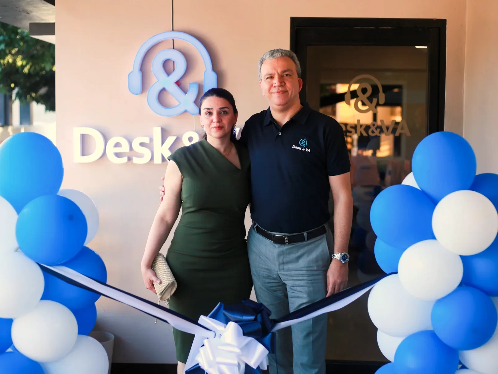 Desk & VA founder Sina Bakhshalian and his wife at the opening of a Desk & VA office in Dumaguete City